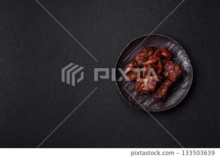 Beef, grilled meat in pieces, or kebab with sauce and vegetables. Beef in pieces Beef, grilled meat in pieces, or kebab with sauce and vegetables. Beef in pieces 133503639