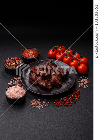 Beef, grilled meat in pieces, or kebab with sauce and vegetables. Beef in pieces Beef, grilled meat in pieces, or kebab with sauce and vegetables. Beef in pieces 133503653