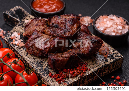Beef, grilled meat in pieces, or kebab with sauce and vegetables. Beef in pieces Beef, grilled meat in pieces, or kebab with sauce and vegetables. Beef in pieces 133503691