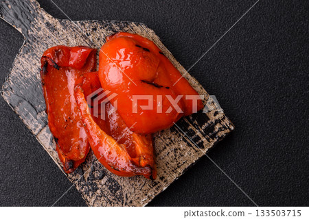 Grilled red bell peppers, vegetarian food. Red bell peppers 133503715