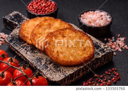 Potato hash browns, a cooked vegetable breakfast food. Potato hash brown Potato hash browns, a cooked vegetable breakfast food. Potato hash brown 133503768