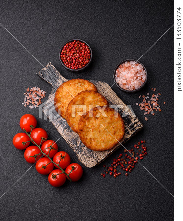 Potato hash browns, a cooked vegetable breakfast food. Potato hash brown 133503774