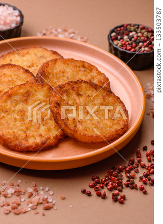 Potato hash browns, a cooked vegetable breakfast food. Potato hash brown 133503787