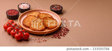 Potato hash browns, a cooked vegetable breakfast food. Potato hash brown 133503788