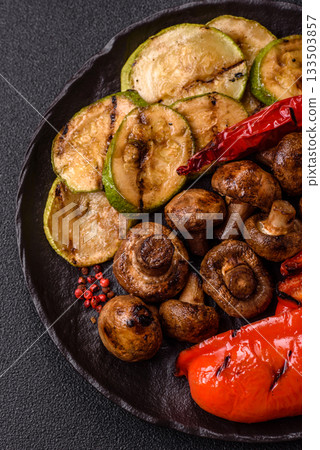 Grilled vegetables, bell peppers, mushrooms, and zucchini, a vegetarian meal. Grilled vegetables Grilled vegetables, bell peppers, mushrooms, and zucchini, a vegetarian meal. Grilled vegetables 133503857