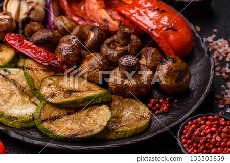 Grilled vegetables, bell peppers, mushrooms, and zucchini, a vegetarian meal. Grilled vegetables 133503859