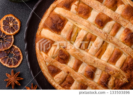 Sweet American pie with apples, pears, and cinnamon, a homemade dessert. Apple American pie 133503896