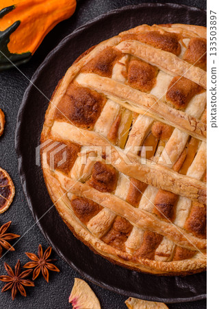 Sweet American pie with apples, pears, and cinnamon, a homemade dessert. Apple American pie 133503897