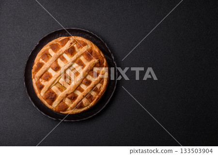 Sweet American pie with apples, pears, and cinnamon, a homemade dessert. Apple American pie 133503904