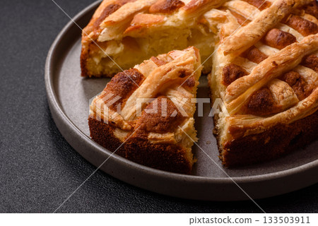 Sweet American pie with apples, pears, and cinnamon, a homemade dessert. Apple American pie 133503911