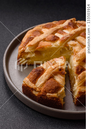 Sweet American pie with apples, pears, and cinnamon, a homemade dessert. Apple American pie 133503914