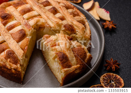 Sweet American pie with apples, pears, and cinnamon, a homemade dessert. Apple American pie 133503915