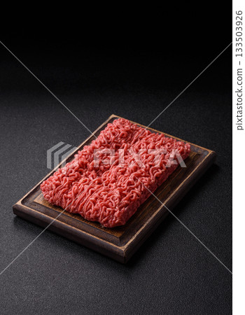 Raw ground beef for a burger or as an ingredient in a meat dish. Raw ground beef 133503926