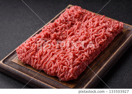 Raw ground beef for a burger or as an ingredient in a meat dish. Raw ground beef 133503927