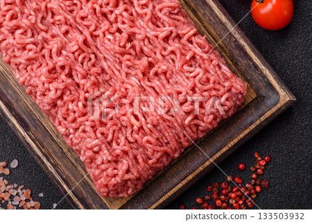 Raw ground beef for a burger or as an ingredient in a meat dish. Raw ground beef 133503932