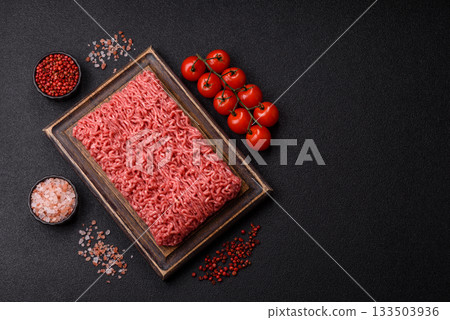 Raw ground beef for a burger or as an ingredient in a meat dish. Raw ground beef 133503936