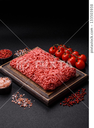 Raw ground beef for a burger or as an ingredient in a meat dish. Raw ground beef Raw ground beef for a burger or as an ingredient in a meat dish. Raw ground beef 133503938