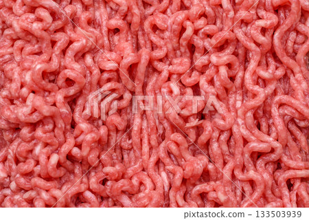 Raw ground beef for a burger or as an ingredient in a meat dish. Raw ground beef 133503939