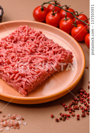 Raw ground beef for a burger or as an ingredient in a meat dish. Raw ground beef Raw ground beef for a burger or as an ingredient in a meat dish. Raw ground beef 133503951