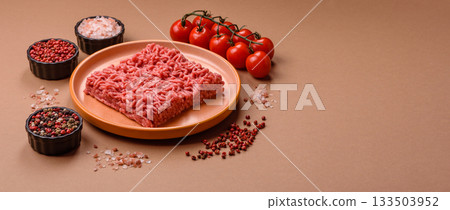 Raw ground beef for a burger or as an ingredient in a meat dish. Raw ground beef Raw ground beef for a burger or as an ingredient in a meat dish. Raw ground beef 133503952