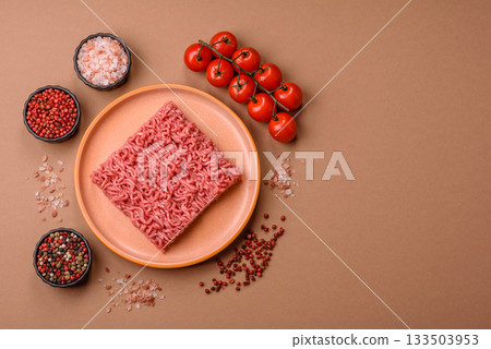 Raw ground beef for a burger or as an ingredient in a meat dish. Raw ground beef 133503953