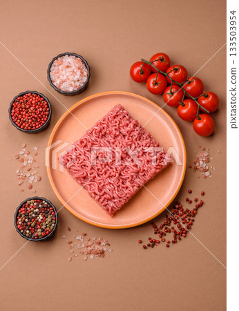 Raw ground beef for a burger or as an ingredient in a meat dish. Raw ground beef 133503954
