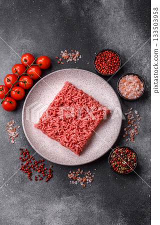 Raw ground beef for a burger or as an ingredient in a meat dish. Raw ground beef Raw ground beef for a burger or as an ingredient in a meat dish. Raw ground beef 133503958