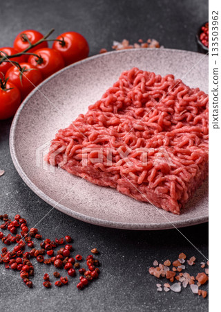 Raw ground beef for a burger or as an ingredient in a meat dish. Raw ground beef 133503962