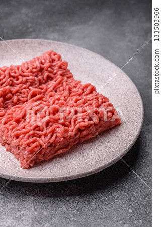Raw ground beef for a burger or as an ingredient in a meat dish. Raw ground beef Raw ground beef for a burger or as an ingredient in a meat dish. Raw ground beef 133503966