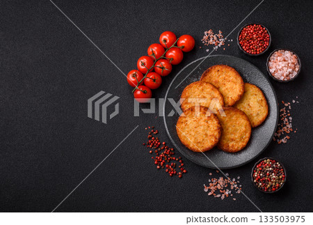 Potato hash browns, a cooked vegetable breakfast food. Potato hash brown 133503975