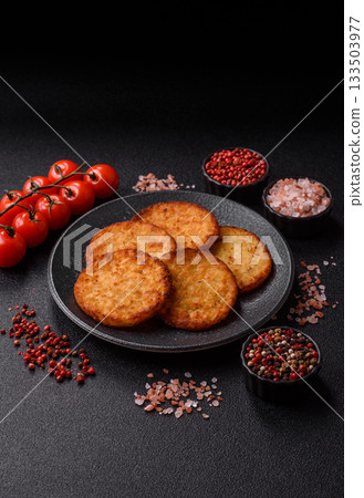 Potato hash browns, a cooked vegetable breakfast food. Potato hash brown Potato hash browns, a cooked vegetable breakfast food. Potato hash brown 133503977