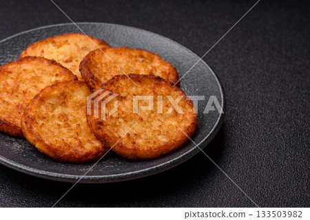 Potato hash browns, a cooked vegetable breakfast food. Potato hash brown Potato hash browns, a cooked vegetable breakfast food. Potato hash brown 133503982