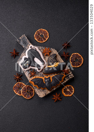 Halloween cookies, sweets, or gingerbread, a cat, a bat, and a hat. Halloween gingerbread Halloween cookies, sweets, or gingerbread, a cat, a bat, and a hat. Halloween gingerbread 133504029