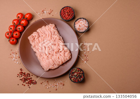 Raw minced chicken for a burger or as an ingredient in a meat dish. Raw ground chicken Raw minced chicken for a burger or as an ingredient in a meat dish. Raw ground chicken 133504056