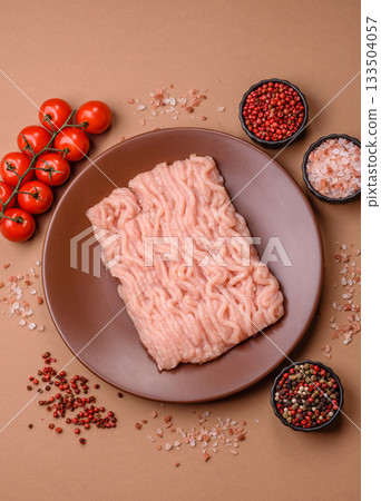 Raw minced chicken for a burger or as an ingredient in a meat dish. Raw ground chicken Raw minced chicken for a burger or as an ingredient in a meat dish. Raw ground chicken 133504057