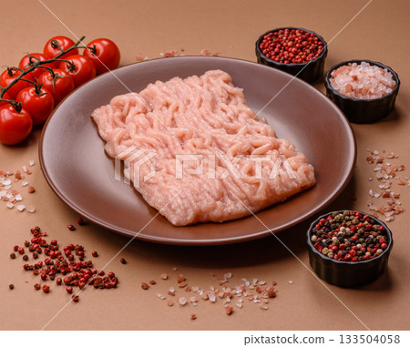 Raw minced chicken for a burger or as an ingredient in a meat dish. Raw ground chicken Raw minced chicken for a burger or as an ingredient in a meat dish. Raw ground chicken 133504058