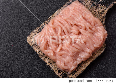 Raw minced chicken for a burger or as an ingredient in a meat dish. Raw ground chicken Raw minced chicken for a burger or as an ingredient in a meat dish. Raw ground chicken 133504064