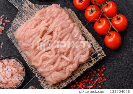 Raw minced chicken for a burger or as an ingredient in a meat dish. Raw ground chicken Raw minced chicken for a burger or as an ingredient in a meat dish. Raw ground chicken 133504068