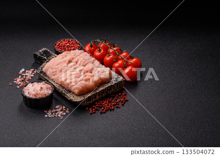 Raw minced chicken for a burger or as an ingredient in a meat dish. Raw ground chicken 133504072