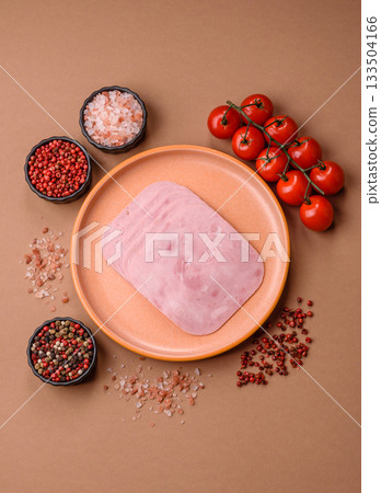 Meat, square ham sliced, organic food, protein for snacks. Sliced ham as a background Meat, square ham sliced, organic food, protein for snacks. Sliced ham as a background 133504166