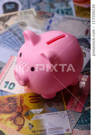 Paper money, banknotes of different countries as a business background. Paper money and cash Paper money, banknotes of different countries as a business background. Paper money and cash 133504230