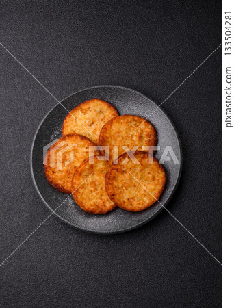 Potato hash browns, a cooked vegetable breakfast food. Potato hash brown 133504281