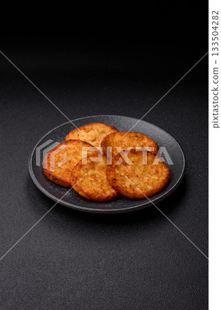 Potato hash browns, a cooked vegetable breakfast food. Potato hash brown Potato hash browns, a cooked vegetable breakfast food. Potato hash brown 133504282