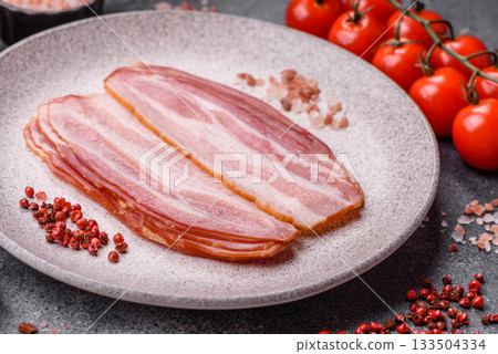 Meat, raw pork bacon sliced, organic food, protein for snacks. Raw bacon as a background Meat, raw pork bacon sliced, organic food, protein for snacks. Raw bacon as a background 133504334