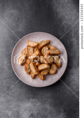 Italian cantuccini cookies with almonds, a sweet biscuit dessert. Cantuccini cookies Italian cantuccini cookies with almonds, a sweet biscuit dessert. Cantuccini cookies 133504345