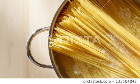 Boiling linguine in a large pot 133504842