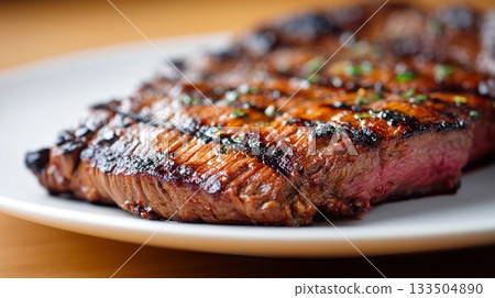 Juicy grilled steak on a white plate 133504890