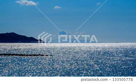 Tokyo Bay - A view of the Uraga Channel with a sailing ship passing through. The island in the background is Oshima. Tokyo Bay - A view of the Uraga Channel with a sailing ship passing through. The island in the background is Oshima. 133505778