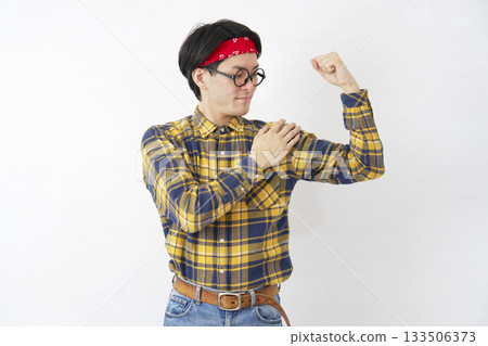 Akihabara-style male bicep gesture white background Akihabara-style male bicep gesture white background 133506373