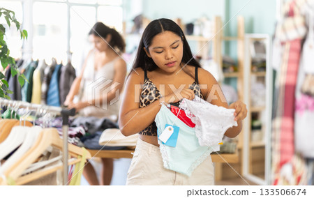 Girl at trading floor pick out and buying panties 133506674
